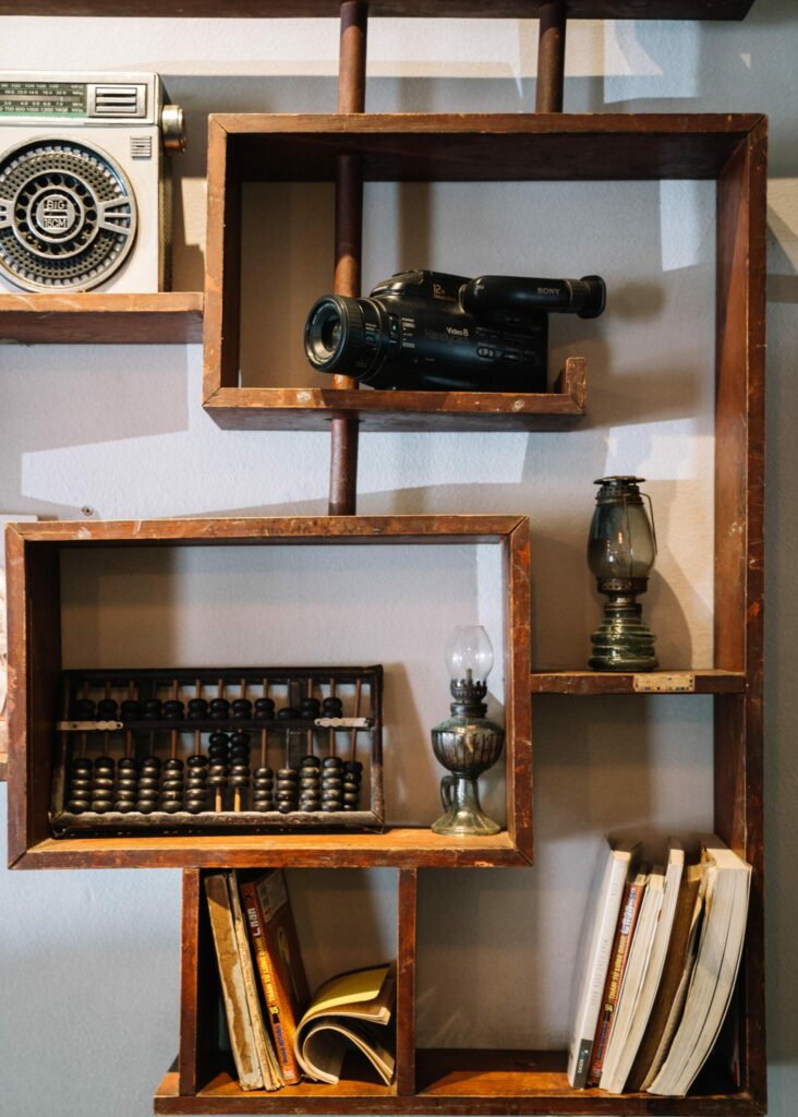 Vintage Items on Wooden Shelf